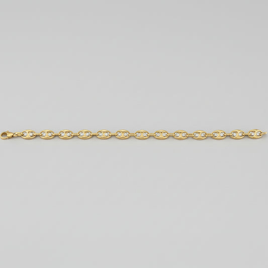 Gold chain bracelet on a white background