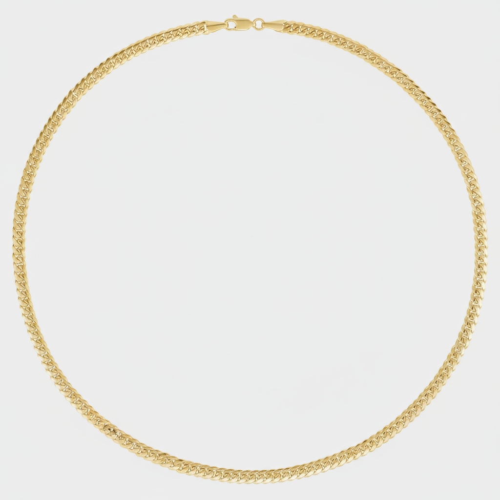 Gold chain necklace on a white background