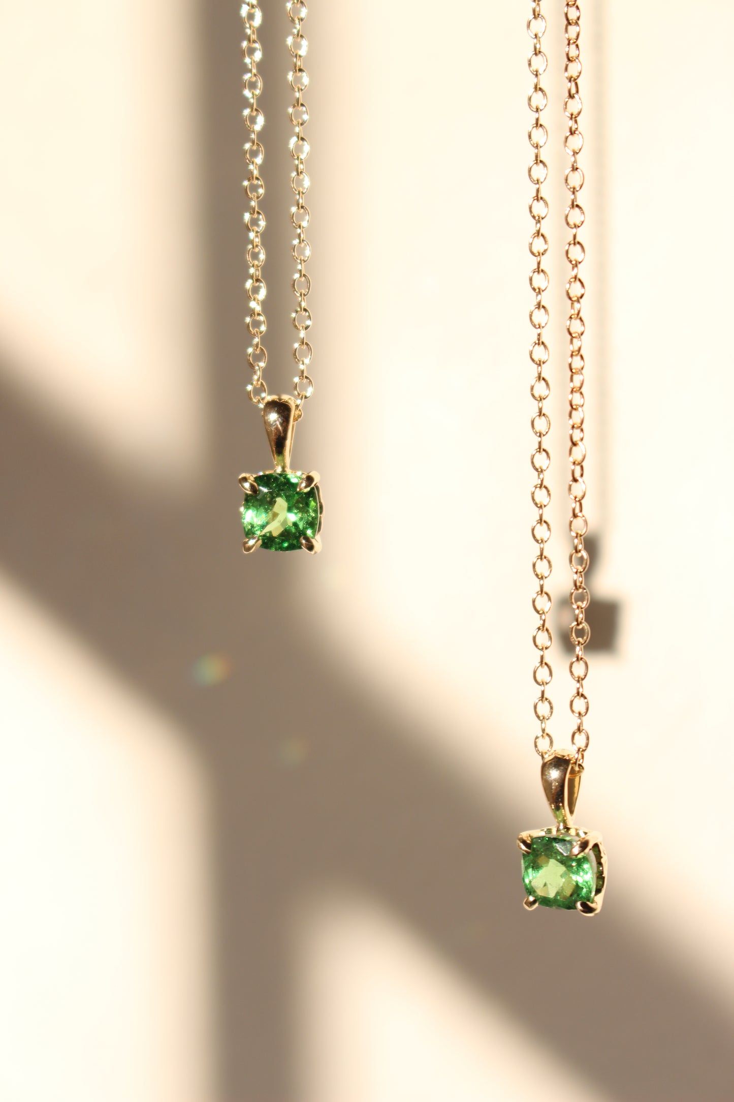 Two necklaces set with tsavorite garnets