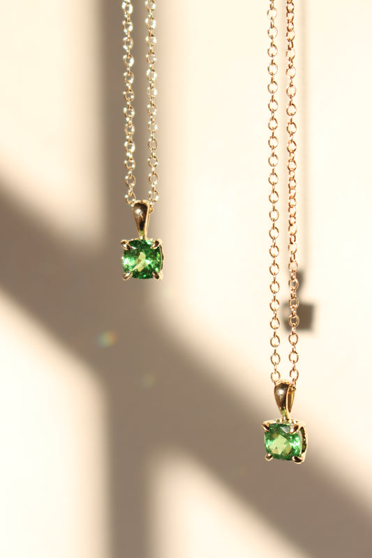 Two necklaces set with tsavorite garnets